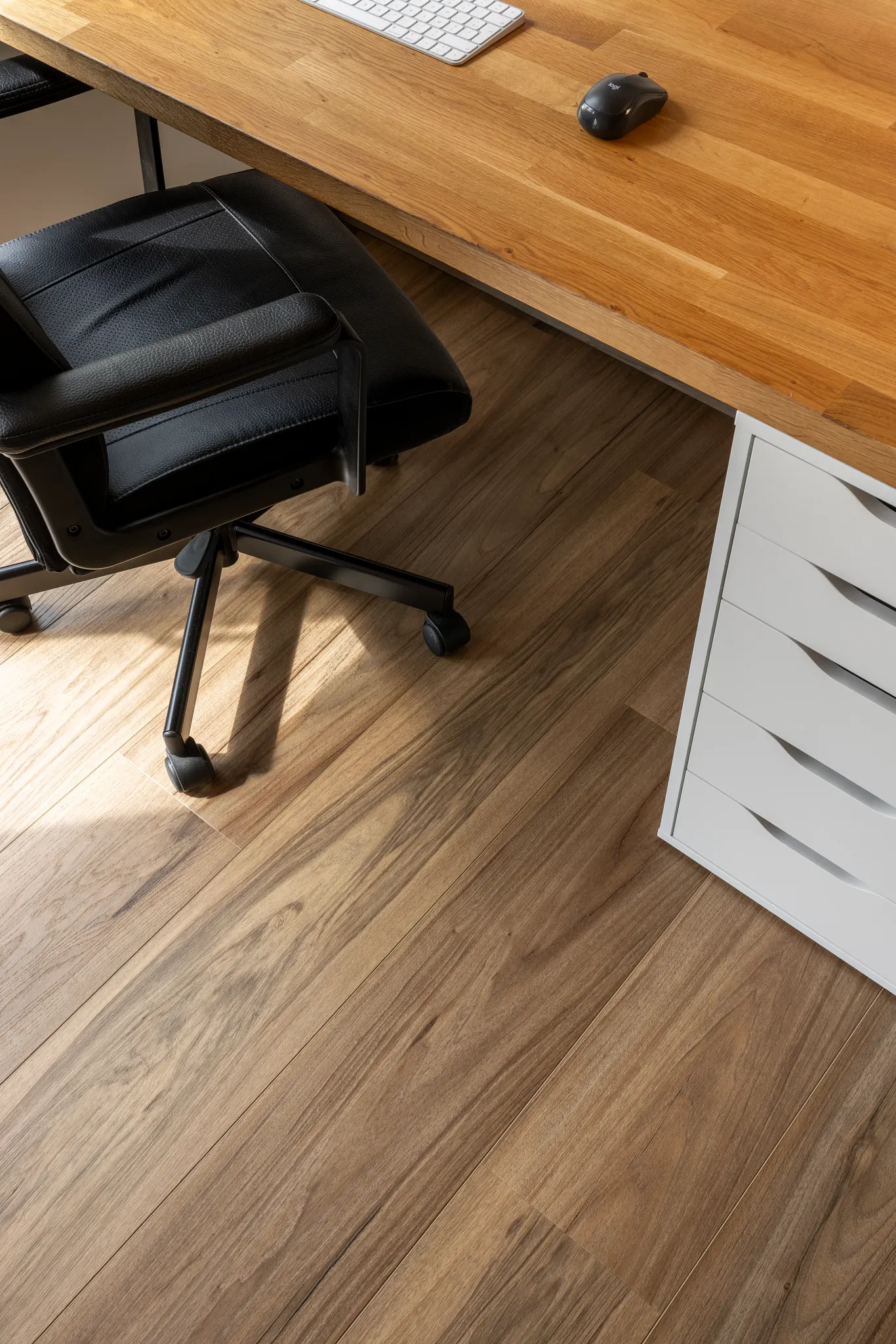 Wood oak look luxury vinyl plank floor shade dark brown in industrial home