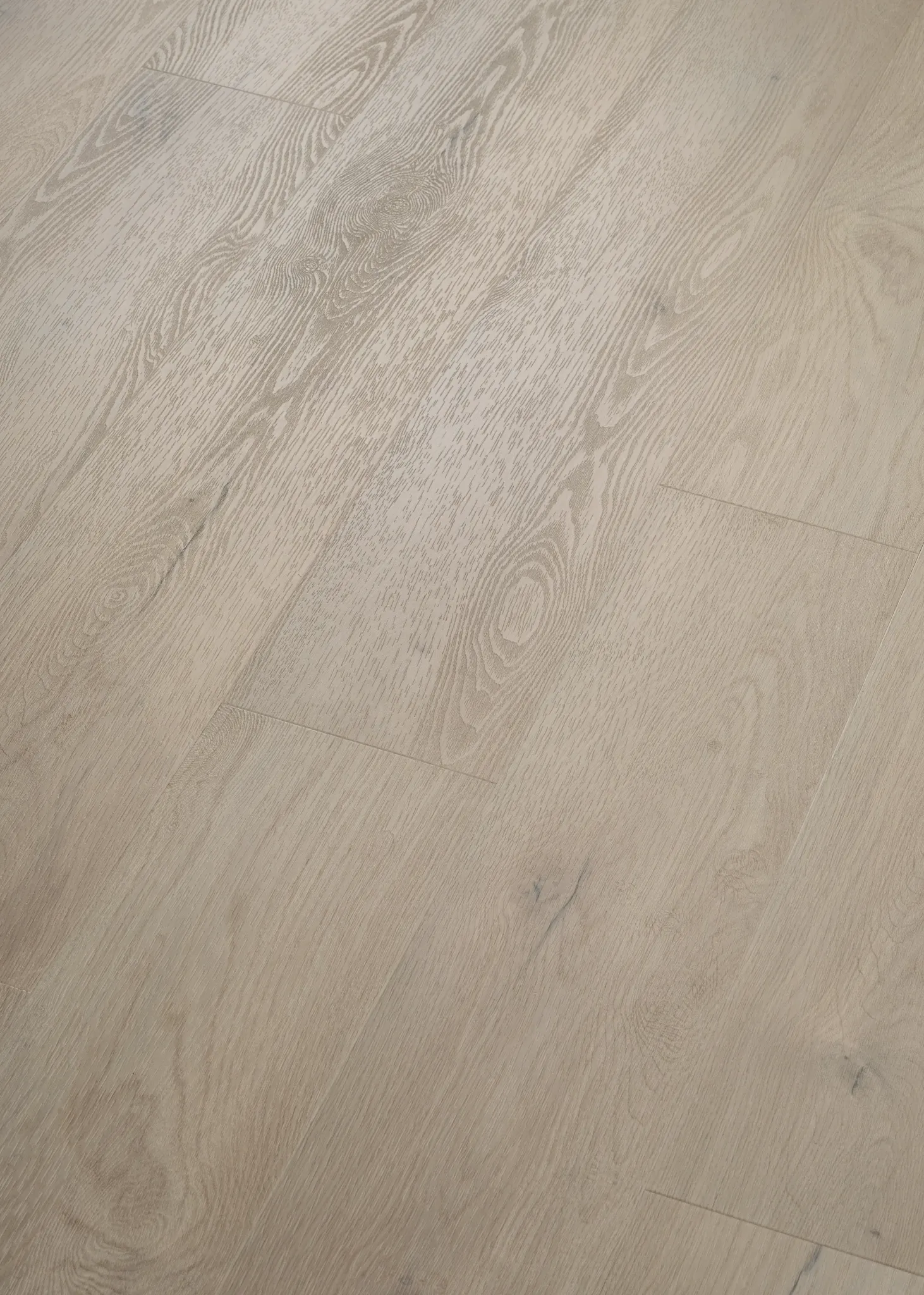 Light oak wood look luxury vinyl plank flooring with natural grain texture