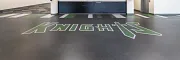 Durable LVT flooring for educational spaces Education facility with heavy commercial luxury vinyl tile flooring featuring "Knights" logo