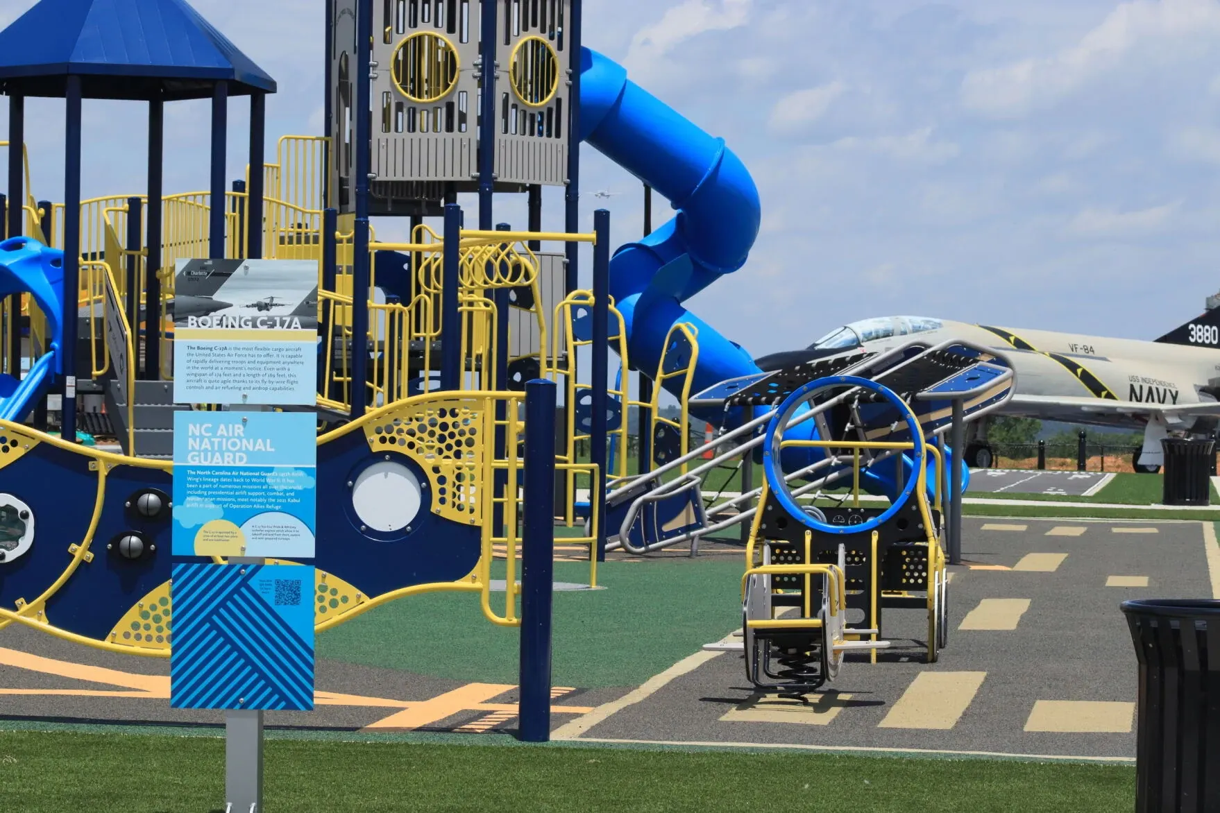 Colorful playground with blue and yellow equipment