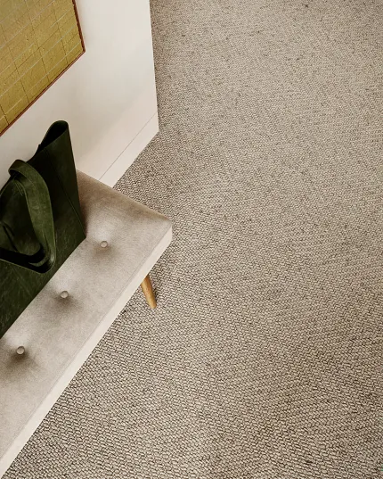 Beige Wool Carpet - Soft Surface by Anderson Tuftex Beige 100% Wool Carpet in a modern room with a bench and green bag