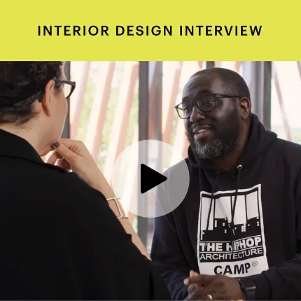 Interior Design Interview in Modern Setting Interior design interview with two individuals discussing in a modern setting