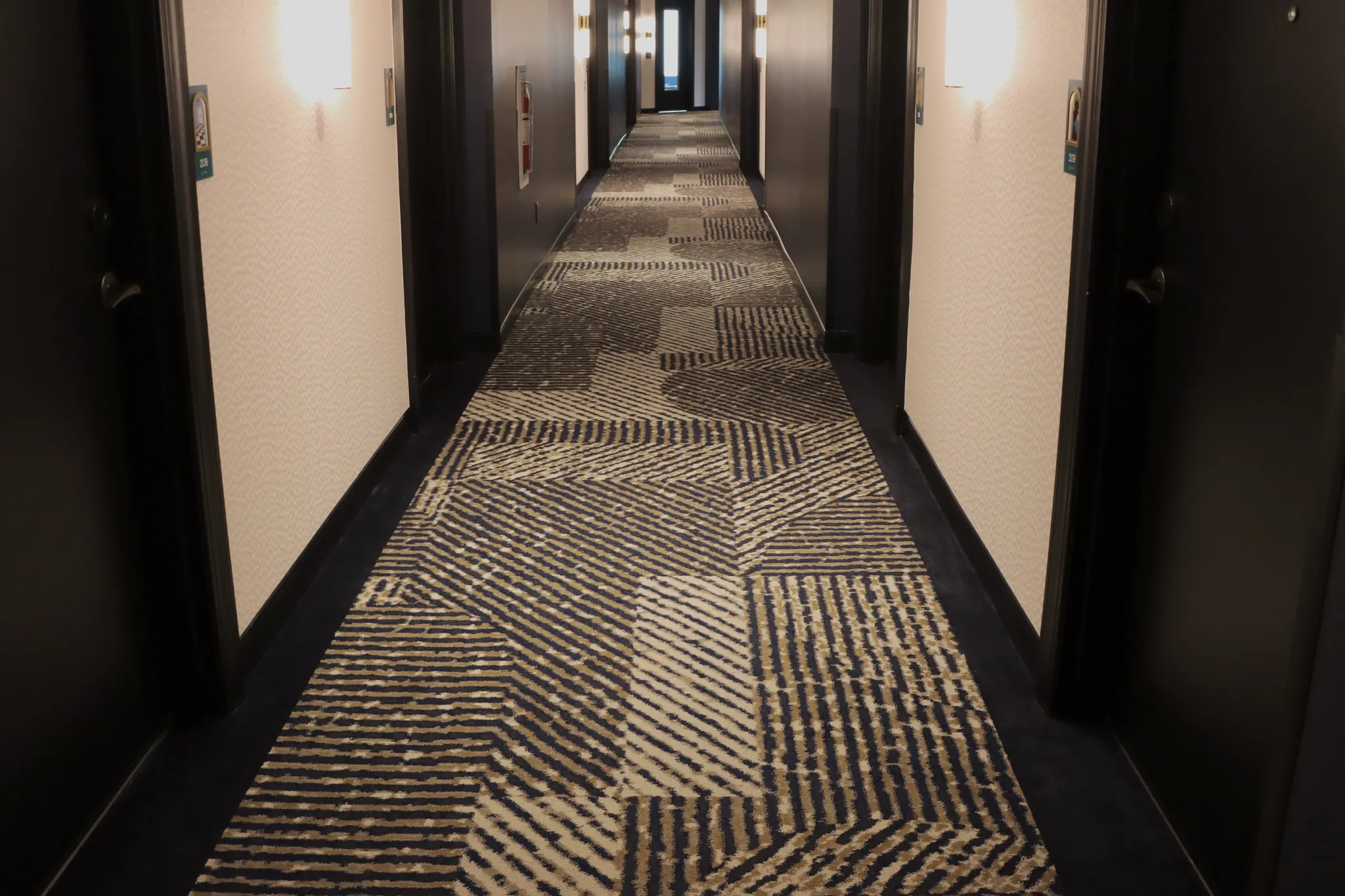 Patterned carpet in a hotel hallway