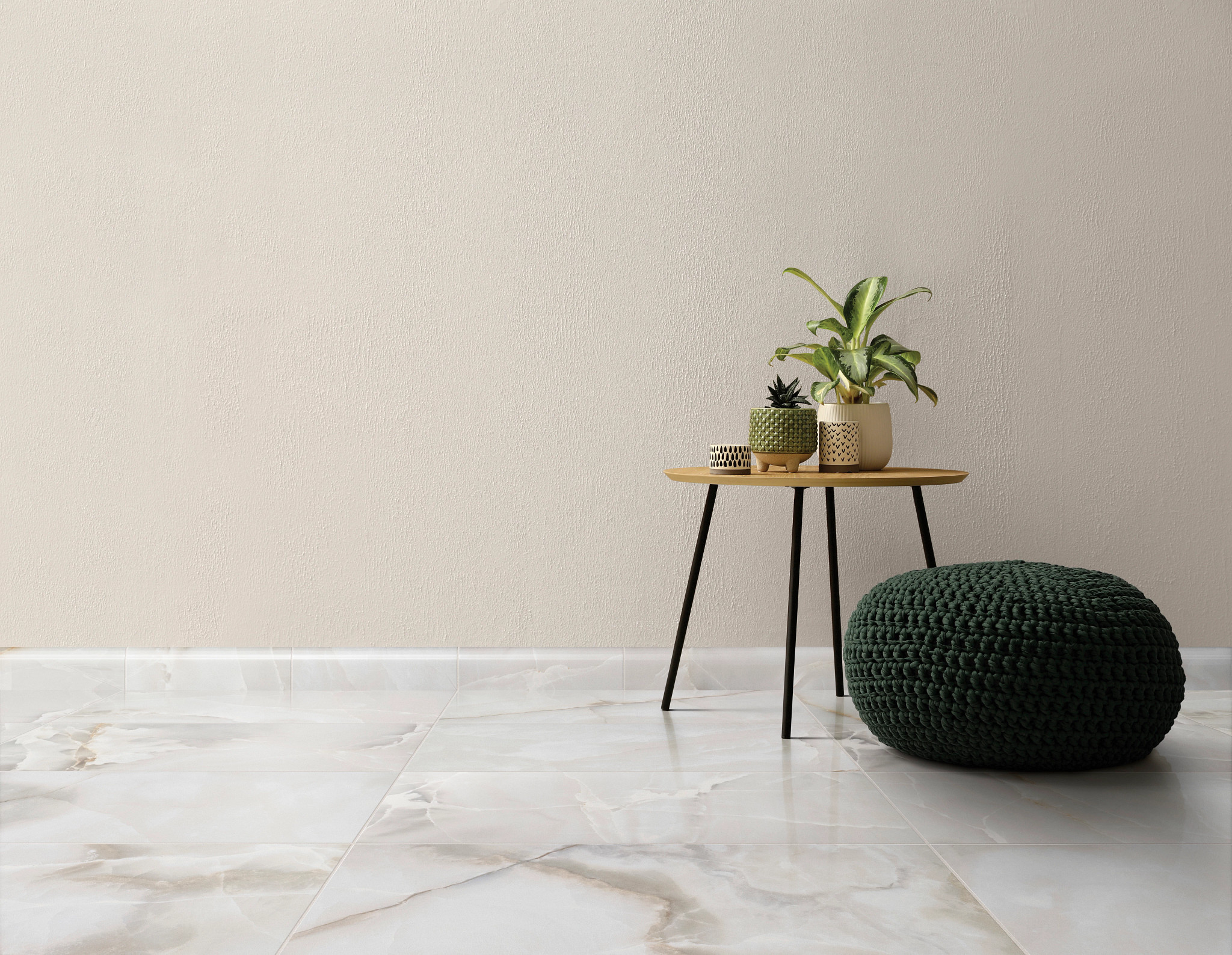 Modern room scene with marble-look porcelain tiles, featuring a small wooden table with plants and a green pouf
