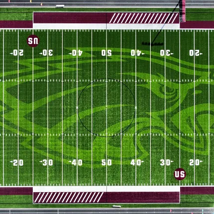 Romulus Eagles Artificial Turf Football Field Aerial view of Romulus Eagles football field with artificial turf featuring green and maroon colors
