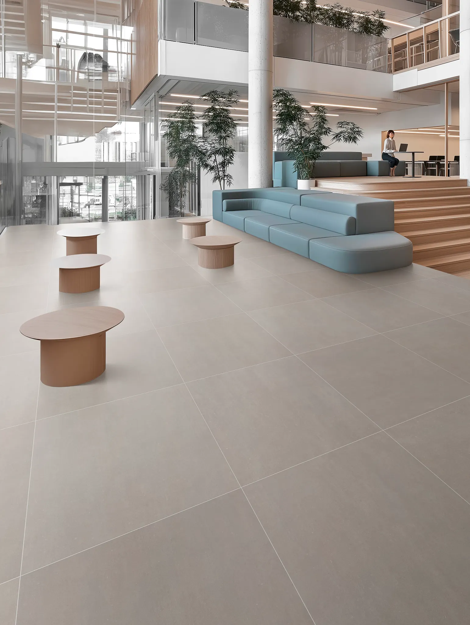 Modern workplace with beige porcelain tile flooring
