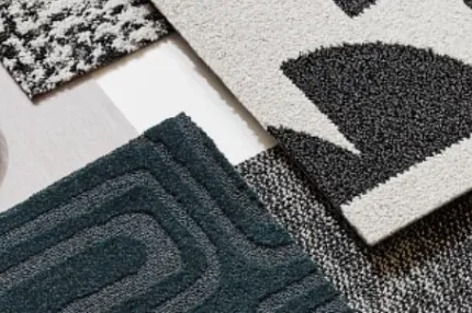 Stylish carpet designs for modern interiors Assorted carpet swatches in black, white, and dark teal