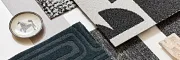 Stylish carpet designs for modern interiors Assorted carpet swatches in black, white, and dark teal