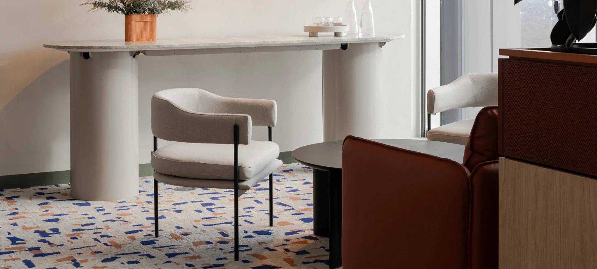 Modern office space with abstract patterned carpet flooring
