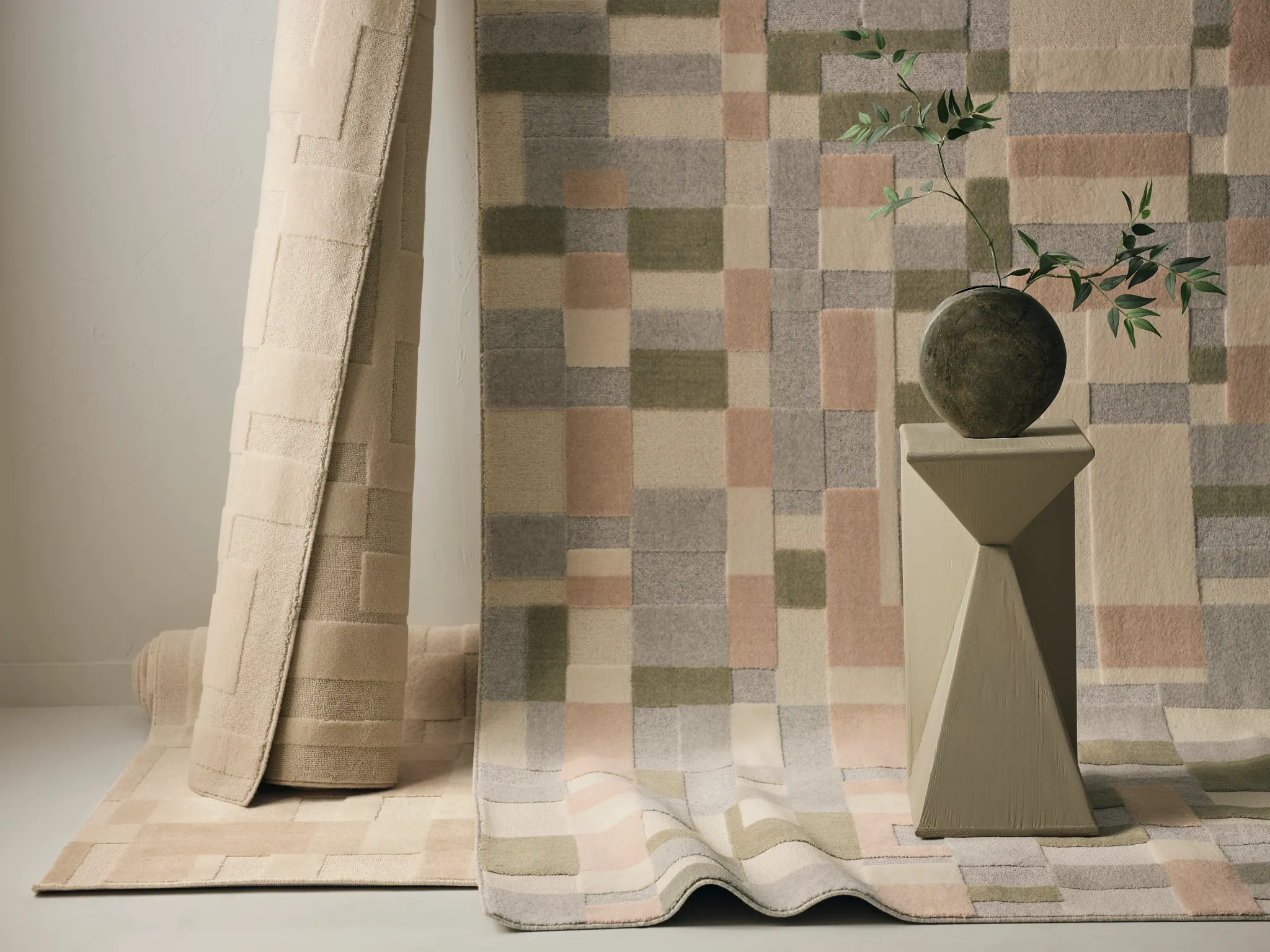 Neutral-toned carpet swatches with geometric patterns