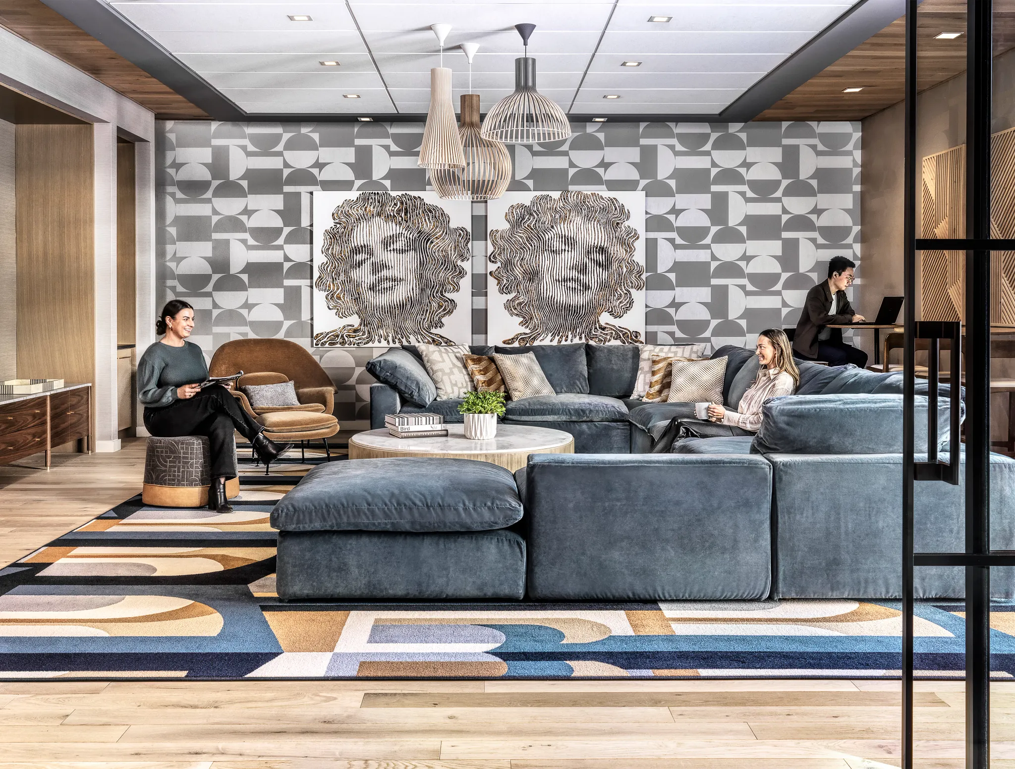 Modern lounge with geometric patterned area rug