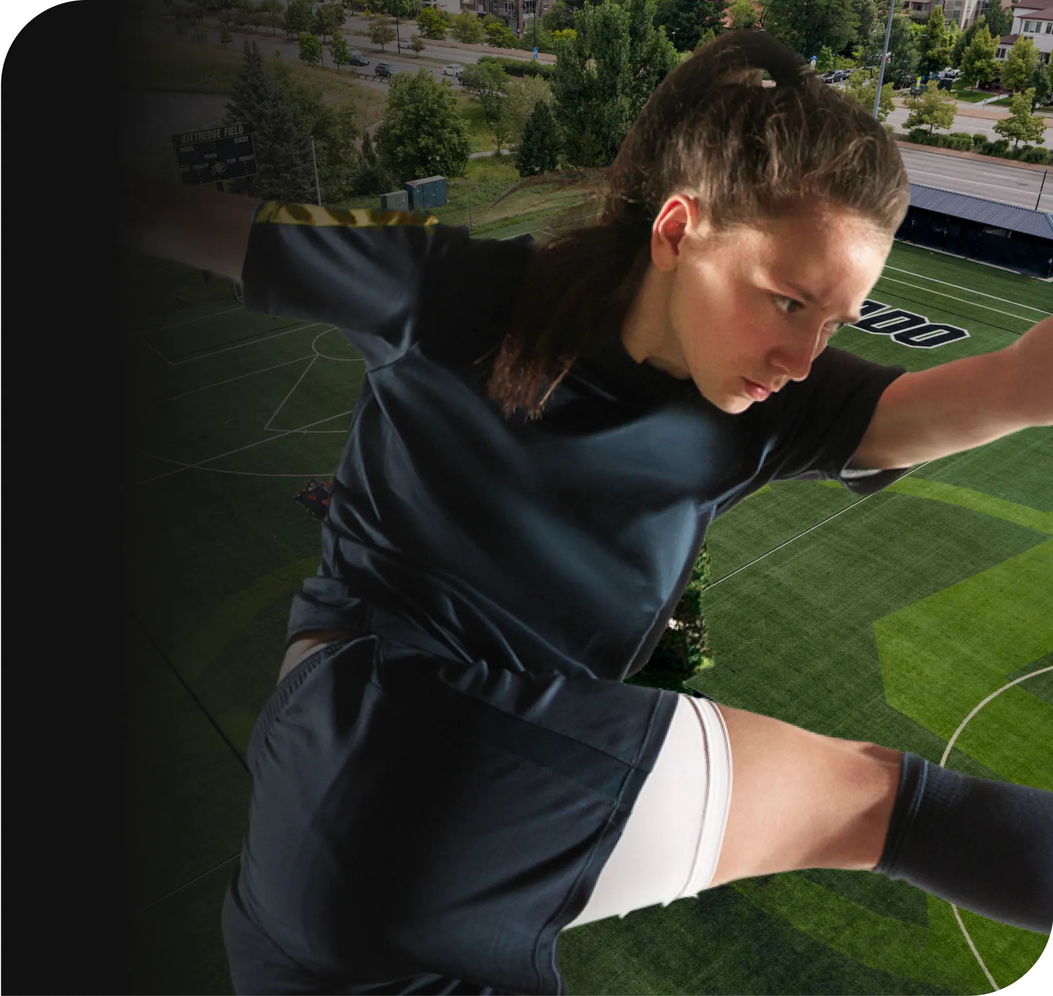 Young athlete in action wearing a dark sports uniform