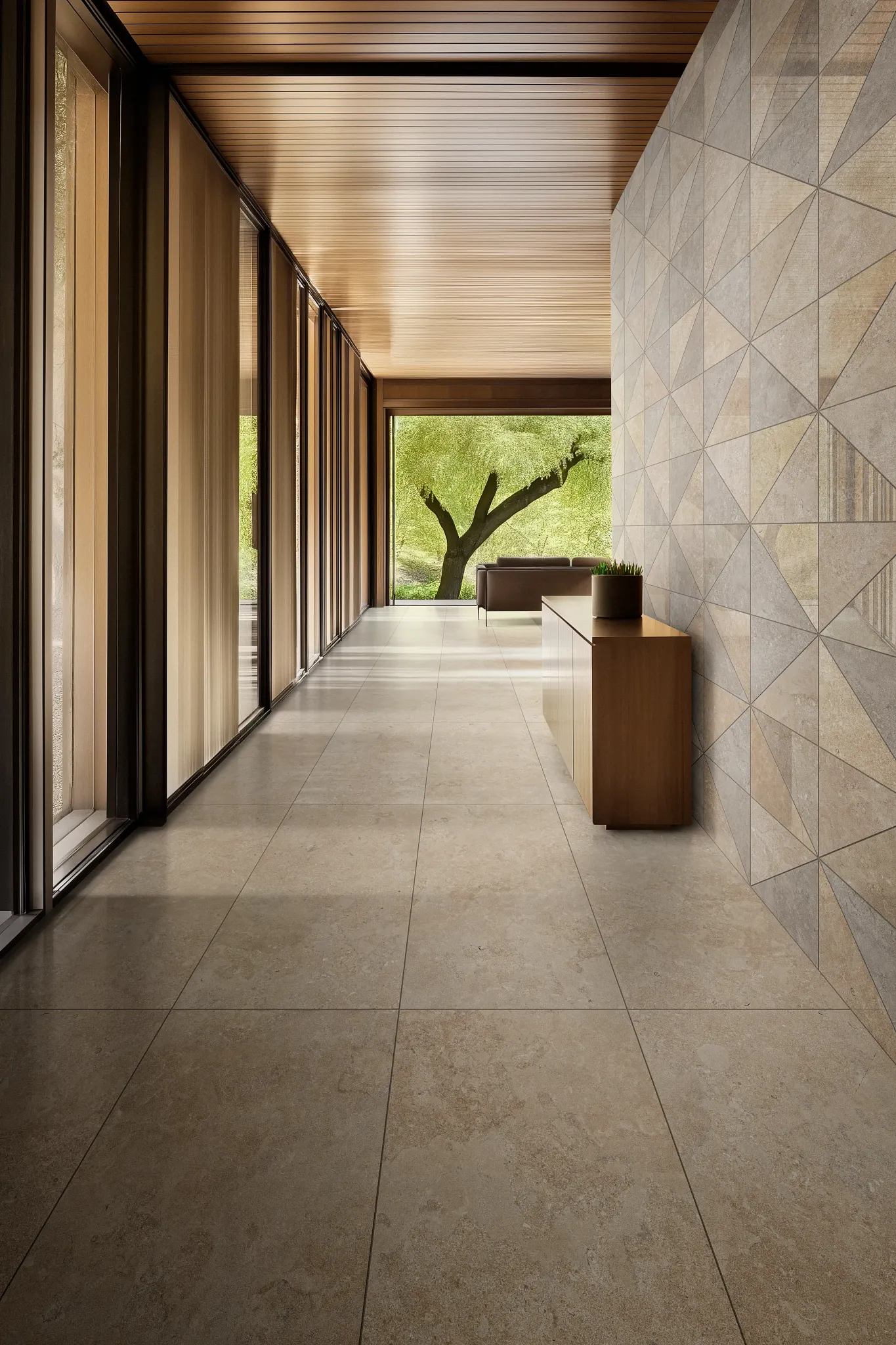 Porcelain tile flooring in a modern hallway with large windows