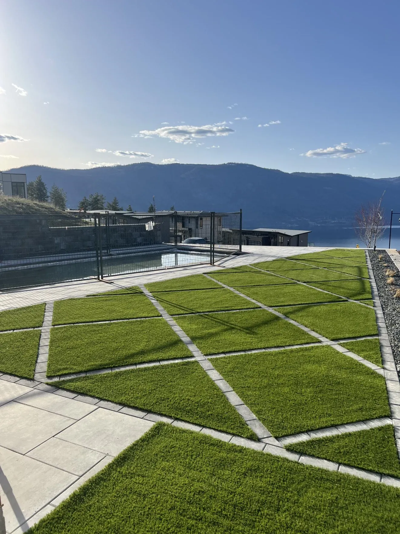 Modern outdoor space with artificial grass and scenic view