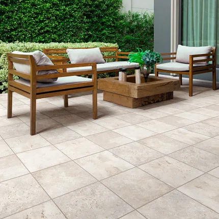 Beige Ceramic Tile Flooring for Outdoor Comfort and Durability Outdoor patio with beige ceramic tile flooring and wooden furniture