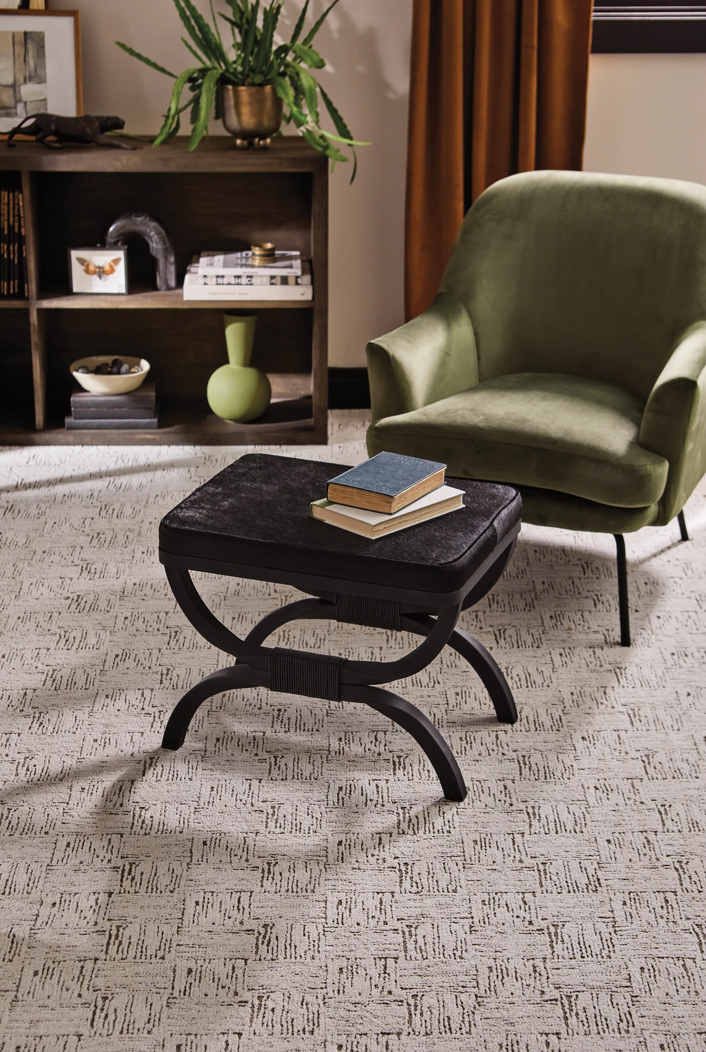 Stylish living room featuring a broadloom carpet with textured black and white pattern