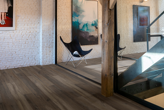 A rustic living room with Coretec vinyl flooring