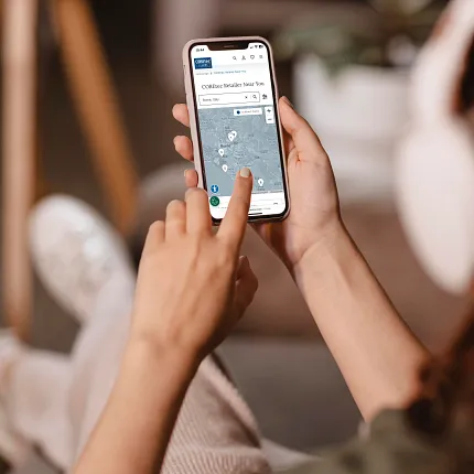COREtec Flooring Retailer Locator on Smartphone Person using a smartphone to locate COREtec flooring retailer in Rome, Italy