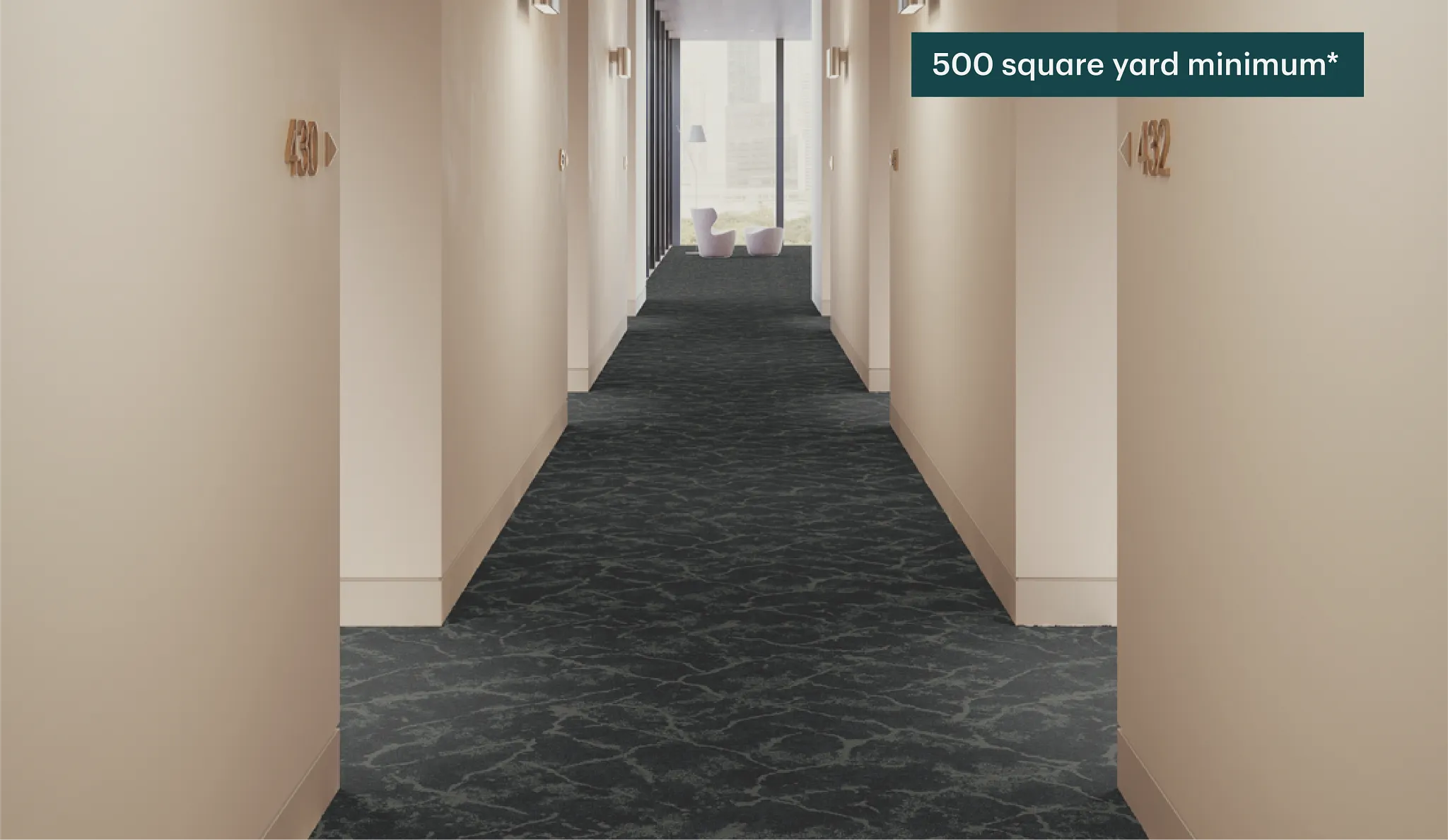 Dark patterned carpet in a hotel hallway