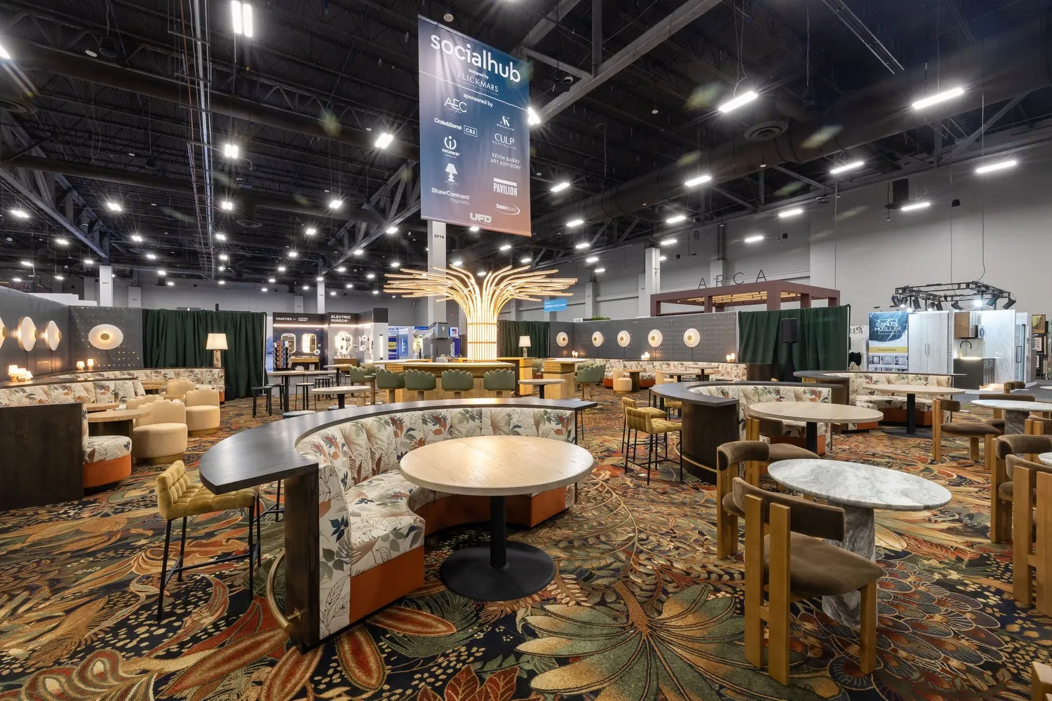 Social hub with floral patterned carpet in hospitality setting