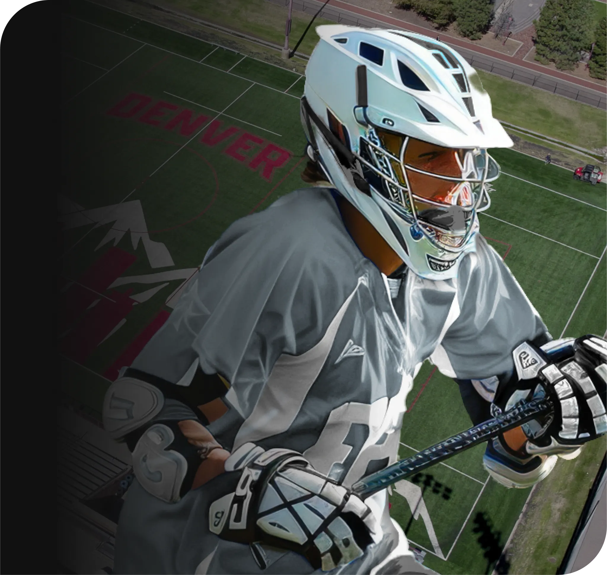 Young athlete in sports gear holding a lacrosse stick