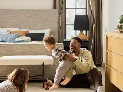 Beige Carpet Flooring for Comfortable and Inviting Home Spaces Cozy family room with beige carpet flooring, showcasing a warm and inviting atmosphere with a family enjoying quality time together