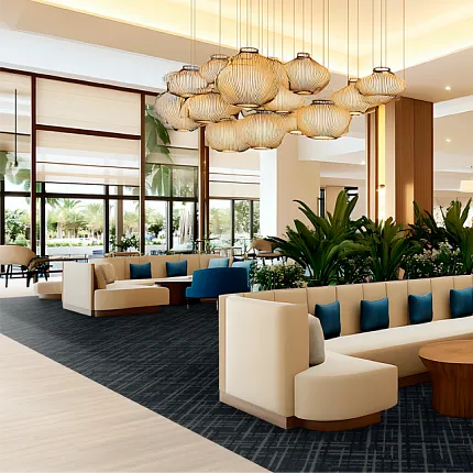 Contemporary hotel lobby design with chic furnishings Modern hotel lobby with stylish seating and elegant lighting