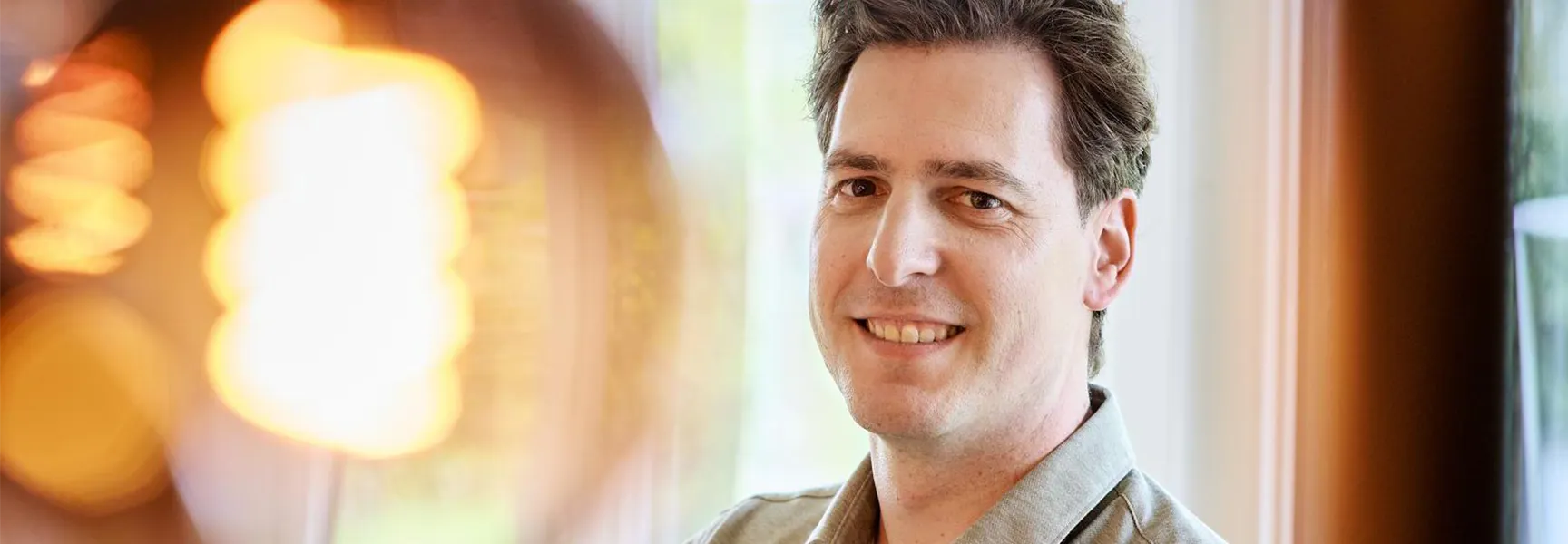 Modern interior with warm lighting and large windows showcasing innovative residential flooring