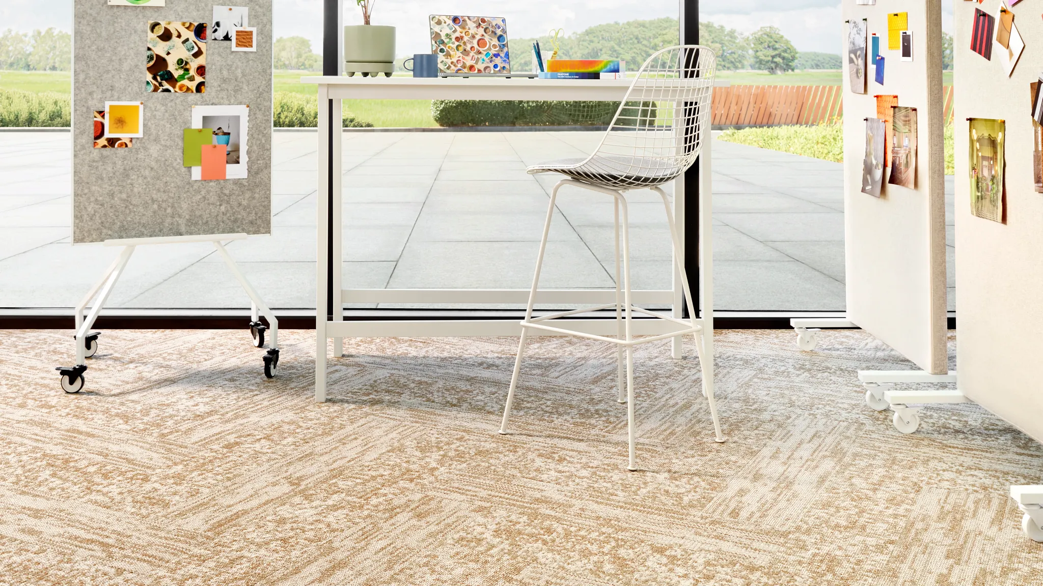 Beige carpet tile in an education facility with creative boards