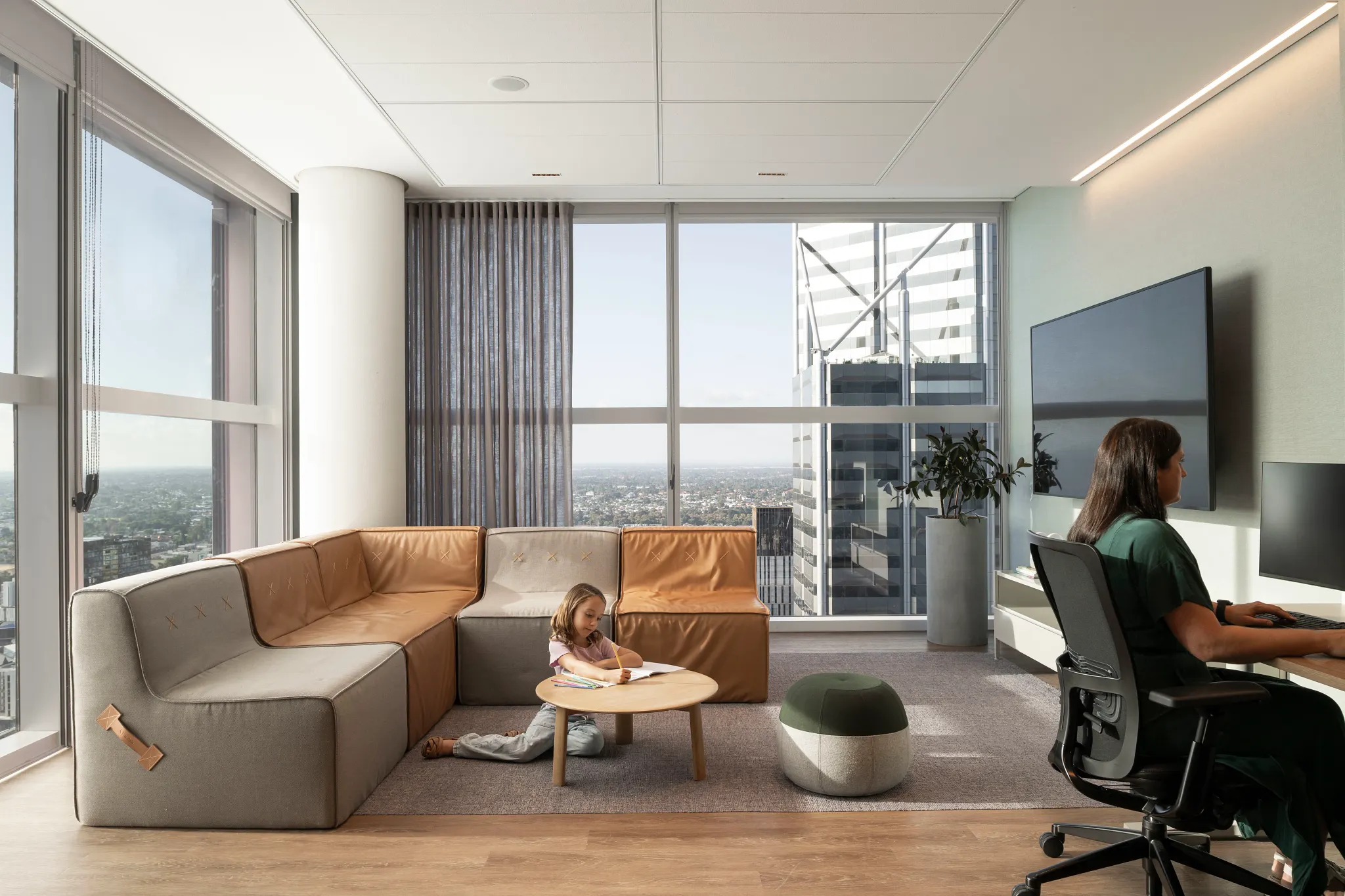 Modern office space with wood flooring and city view