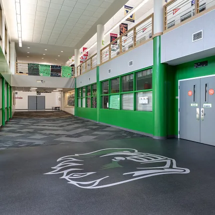 Durable LVT flooring in educational spaces Heavy Commercial Luxury Vinyl Tile flooring in an education facility