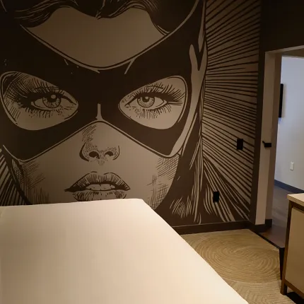 Stylish hospitality carpet flooring for contemporary hotel interiors Modern hotel room with beige carpet flooring and artistic wall design