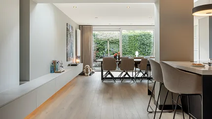 Stylish light wood flooring for contemporary home interiors Modern living room with light wood flooring and dining area