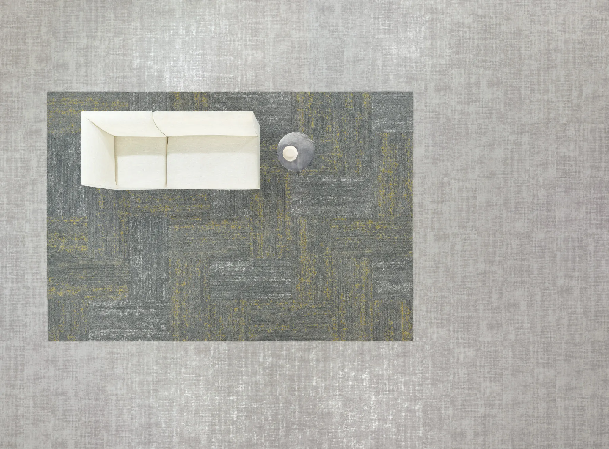 Top view of a modern room with a white sofa and round table on a patterned grey and yellow heavy commercial luxury vinyl tile flooring, 23.62x11.81 in