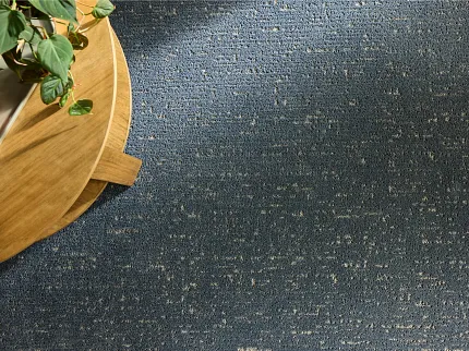 Comfortable and Durable Grey Carpet Flooring for Everyday Home Comfort Cozy children's playroom with durable grey carpet flooring and wooden table set