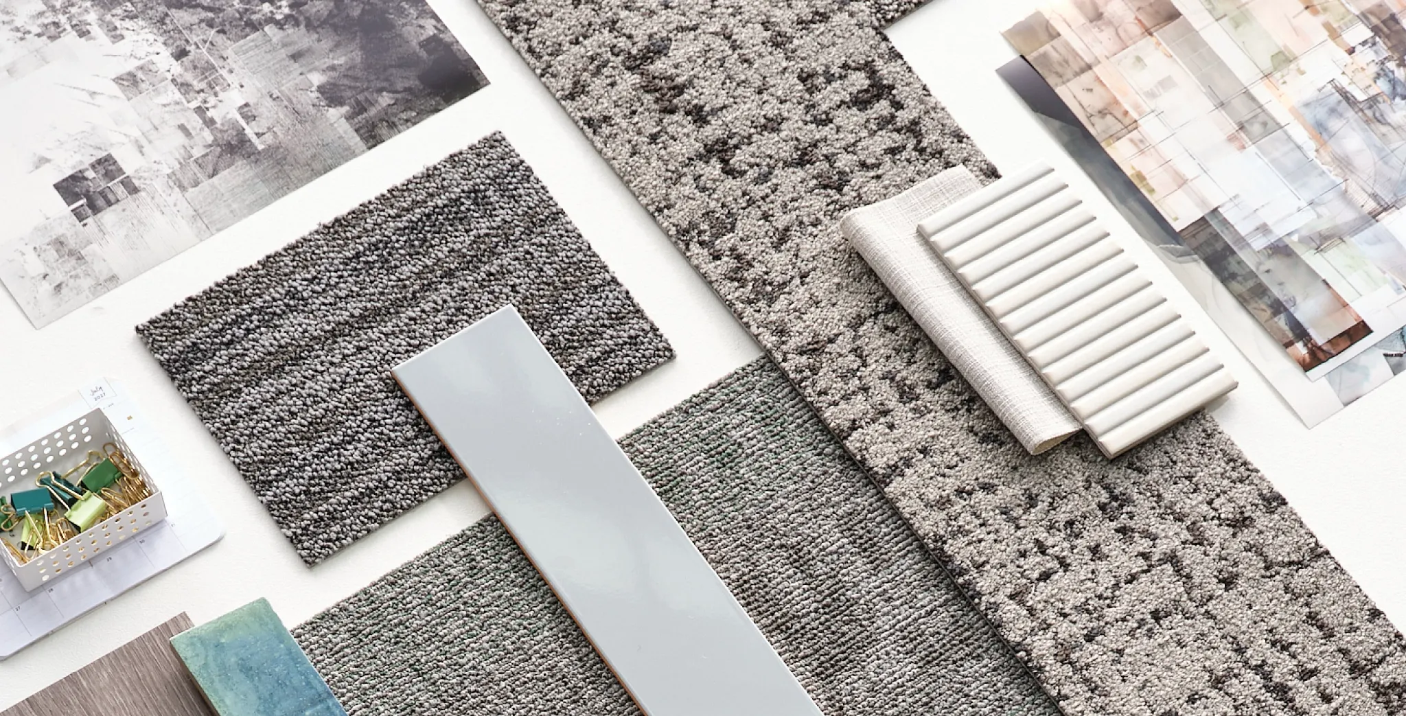 Assorted flooring samples including carpet and tile
