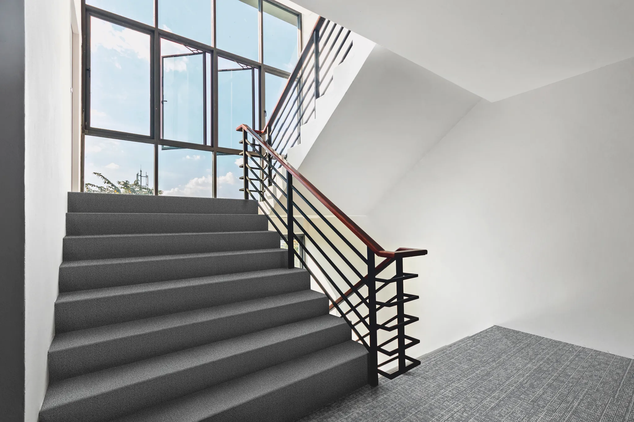 Gray Commercial Carpet Tile in Modern Staircase Setting