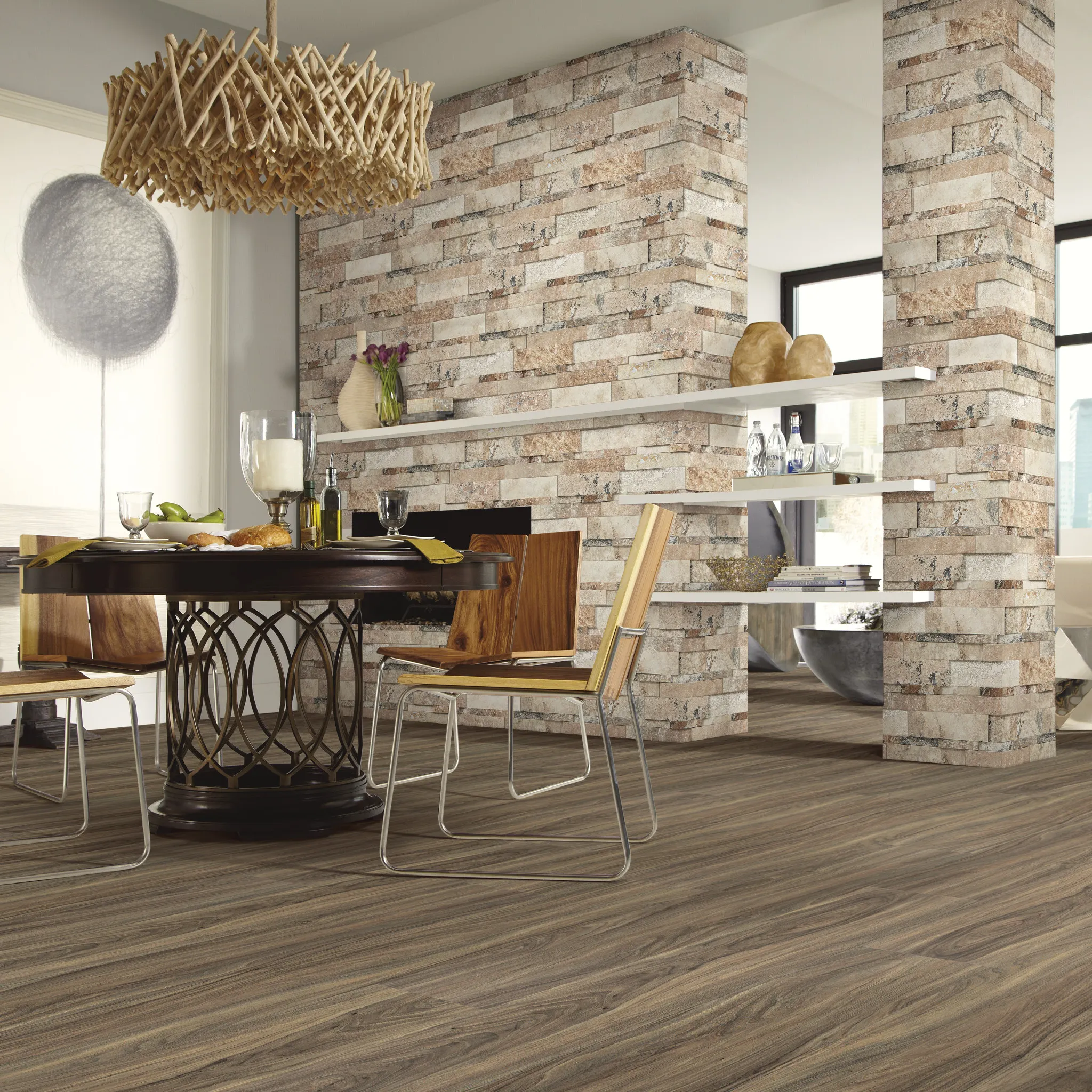 Modern dining room with wood-look laminate flooring and stone accent wall