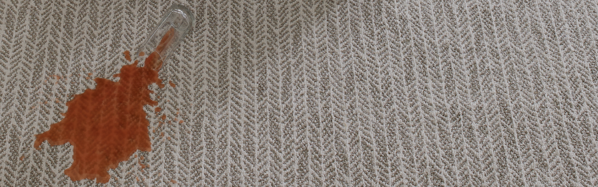 Spilled juice on beautiful, multi-colored, patterened carpet