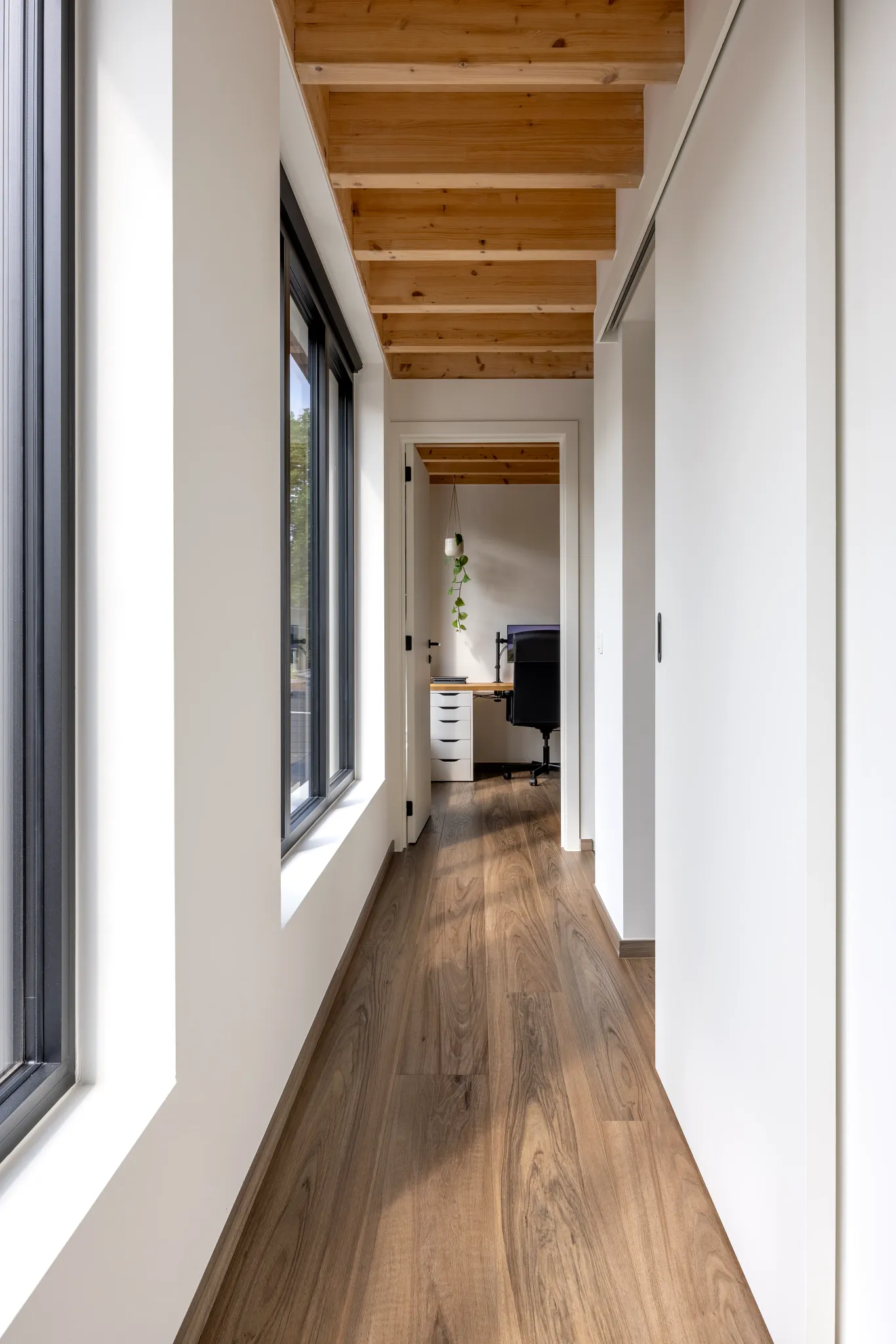 Wood oak look luxury vinyl plank floor shade dark brown in industrial home