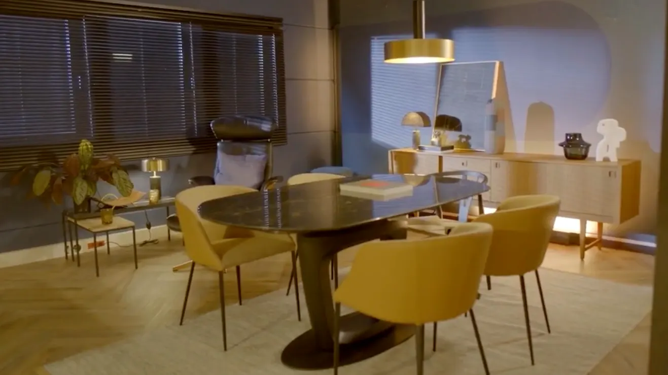 Modern dining room with wood look luxury vinyl plank flooring and stylish furniture