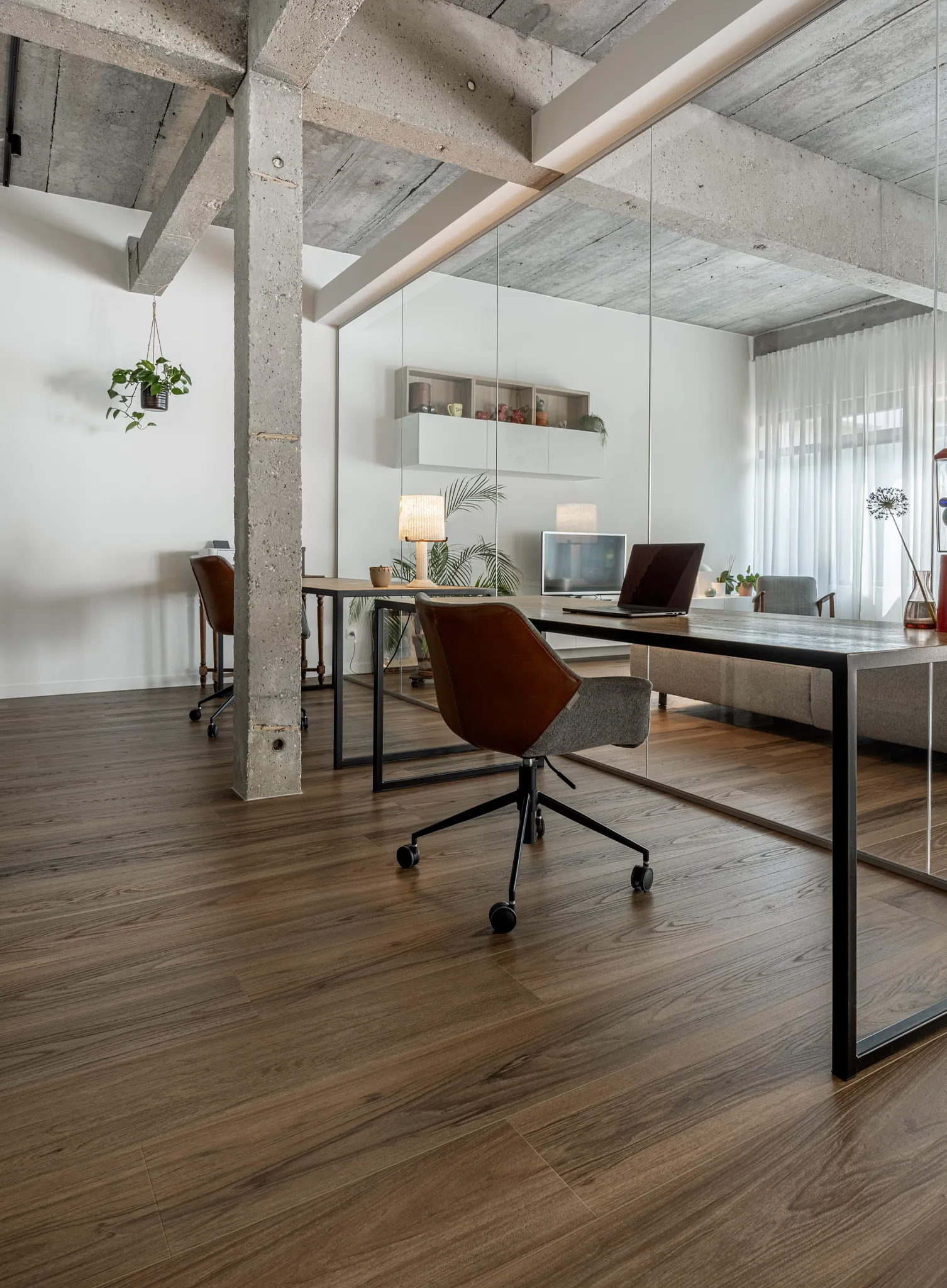 Wood oak look luxury vinyl plank floor shade dark brown in industrial home