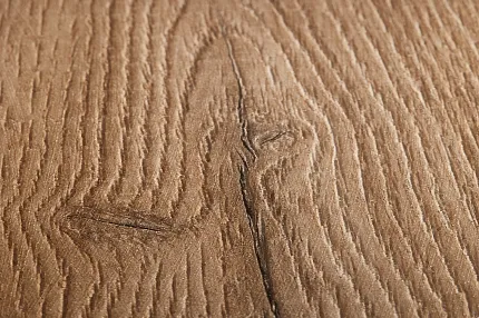 Wood Look Luxury Vinyl Plank Flooring - Warm Brown Texture Close-up of wood grain texture on luxury vinyl plank flooring in warm brown tones