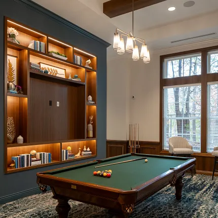 Elegant carpet flooring in a stylish game room setting Luxurious game room with pool table and carpet flooring