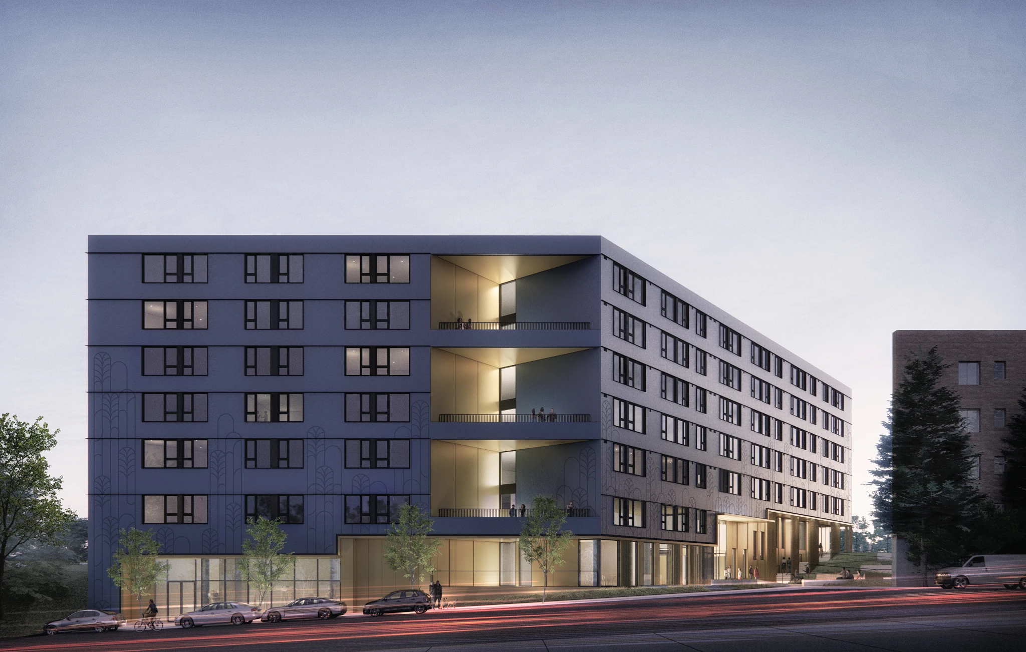 Modern apartment building exterior at dusk