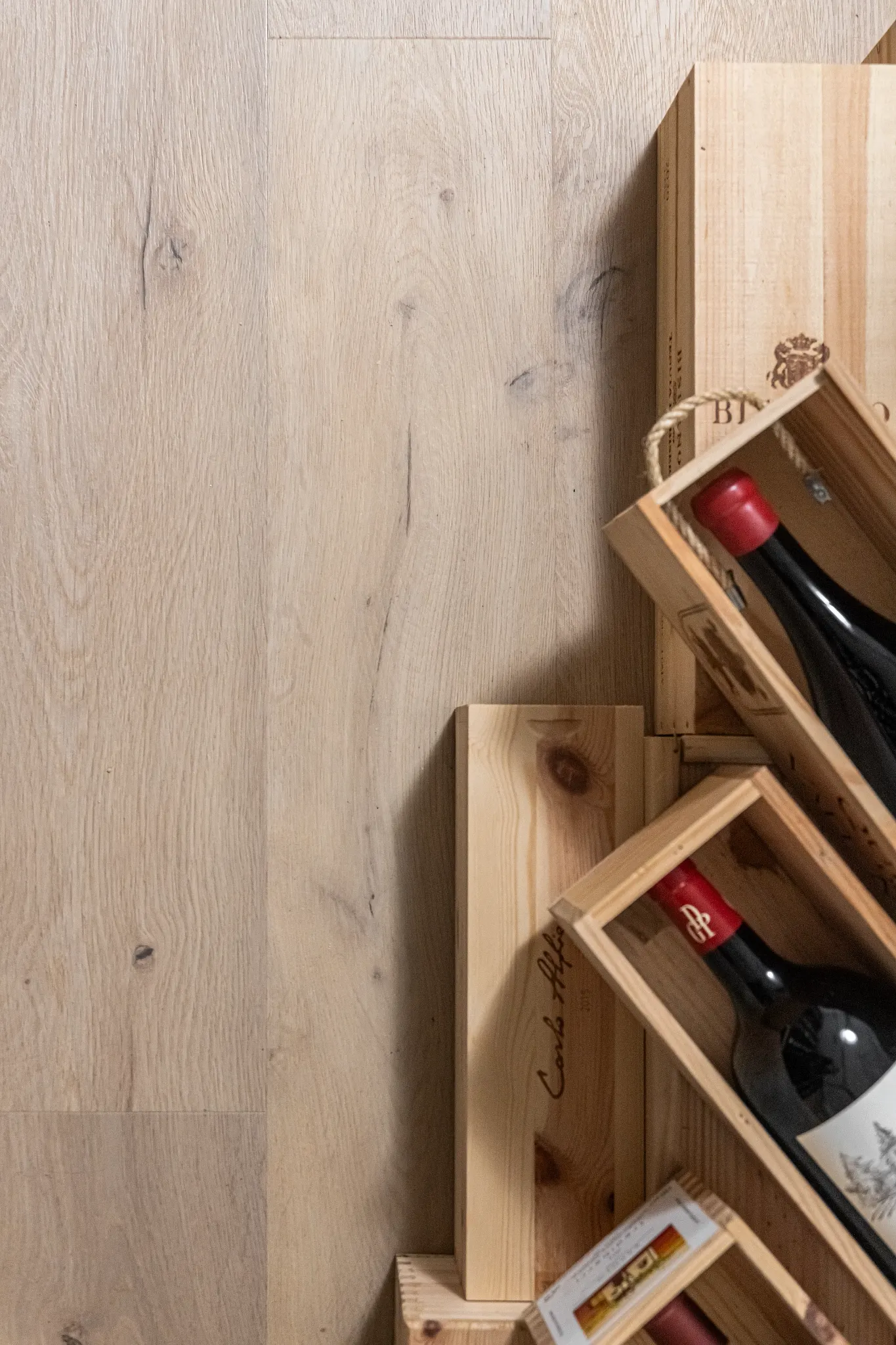 Light wood look vinyl flooring with wine crates