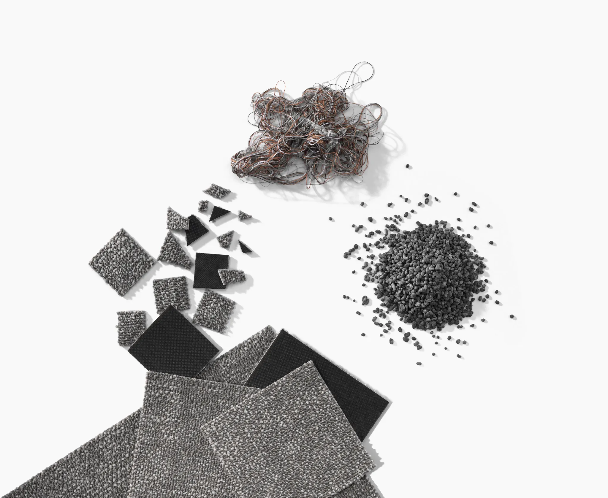 Swatch of commercial carpet tile in shades of grey with material sample