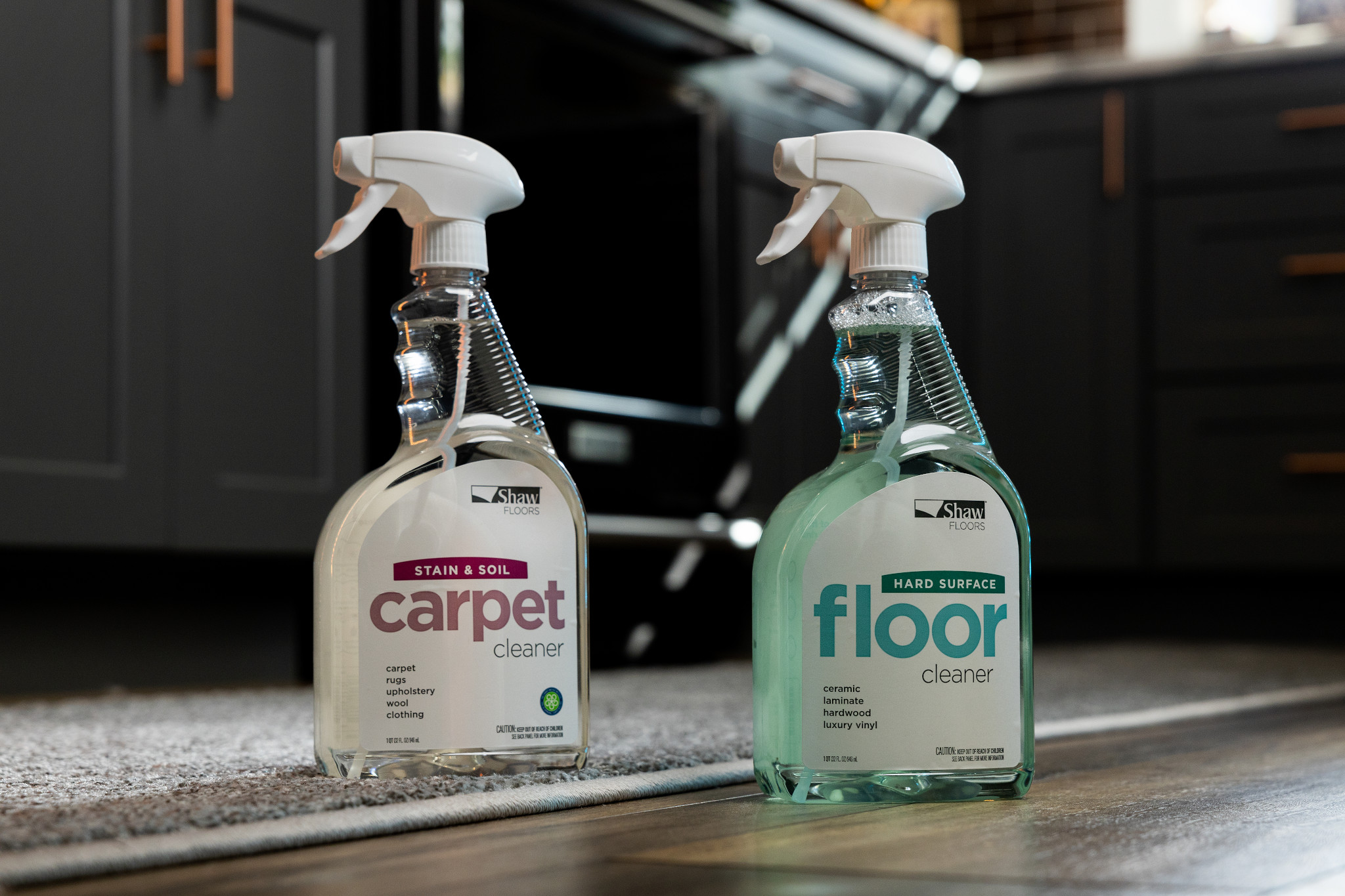 Image of Shaw Floors Carpet Cleaner spray bottle in kitchen.jpg