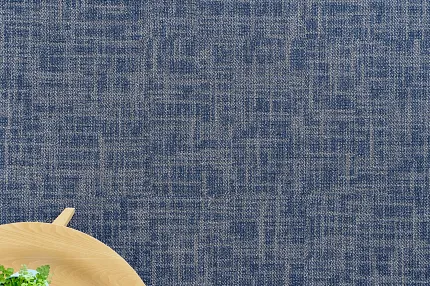 Stylish blue carpet tile for modern interiors Blue commercial carpet tile with wooden table and plant
