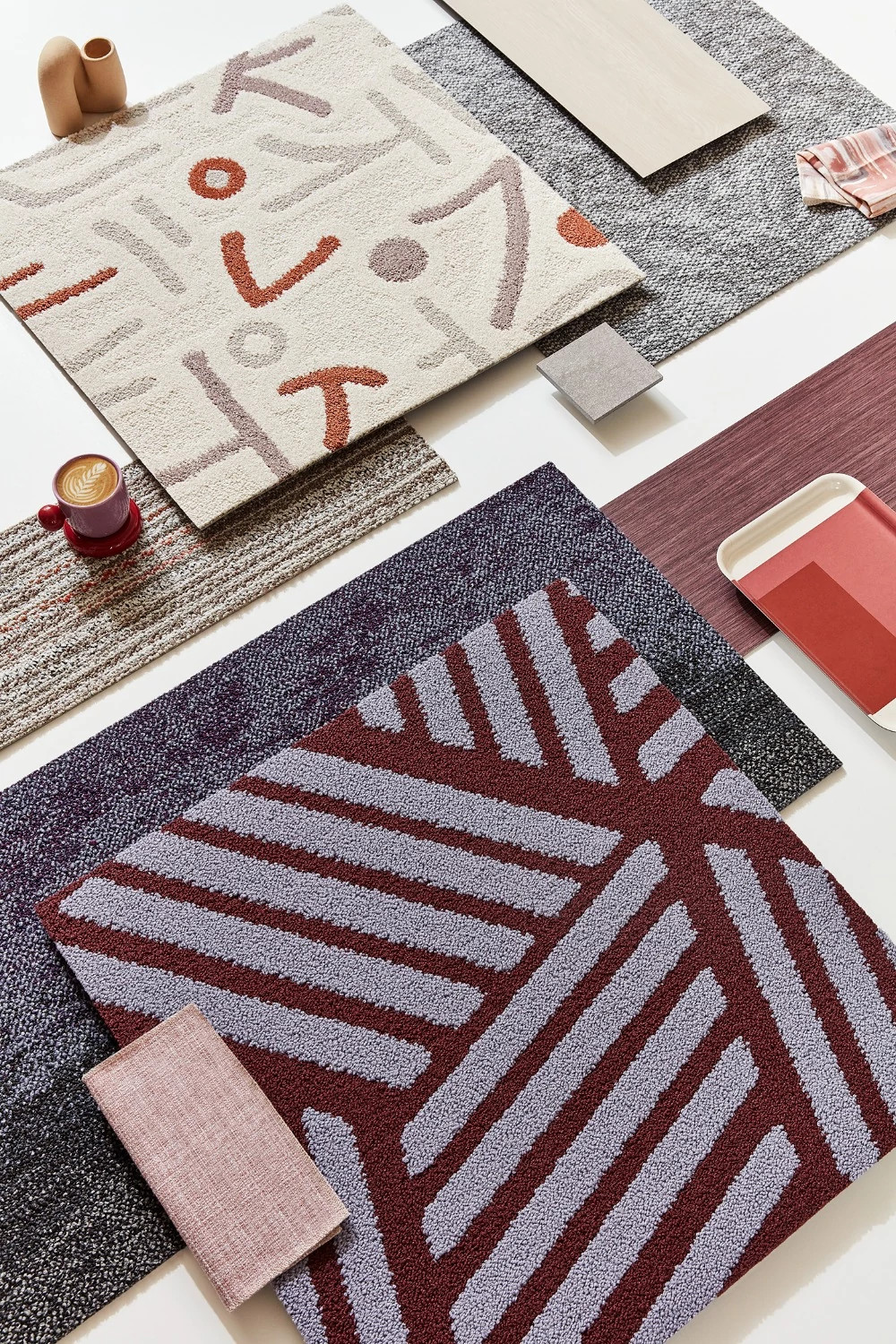 Blue carpet tile with a blue table and white chair
